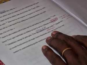 An Africa translator revises a draft translation